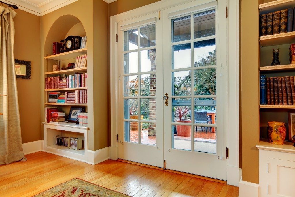 Front door with book shelves on both sides