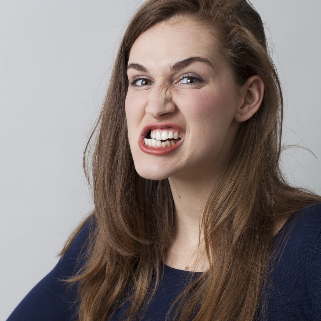 angry woman grinding her teeth
