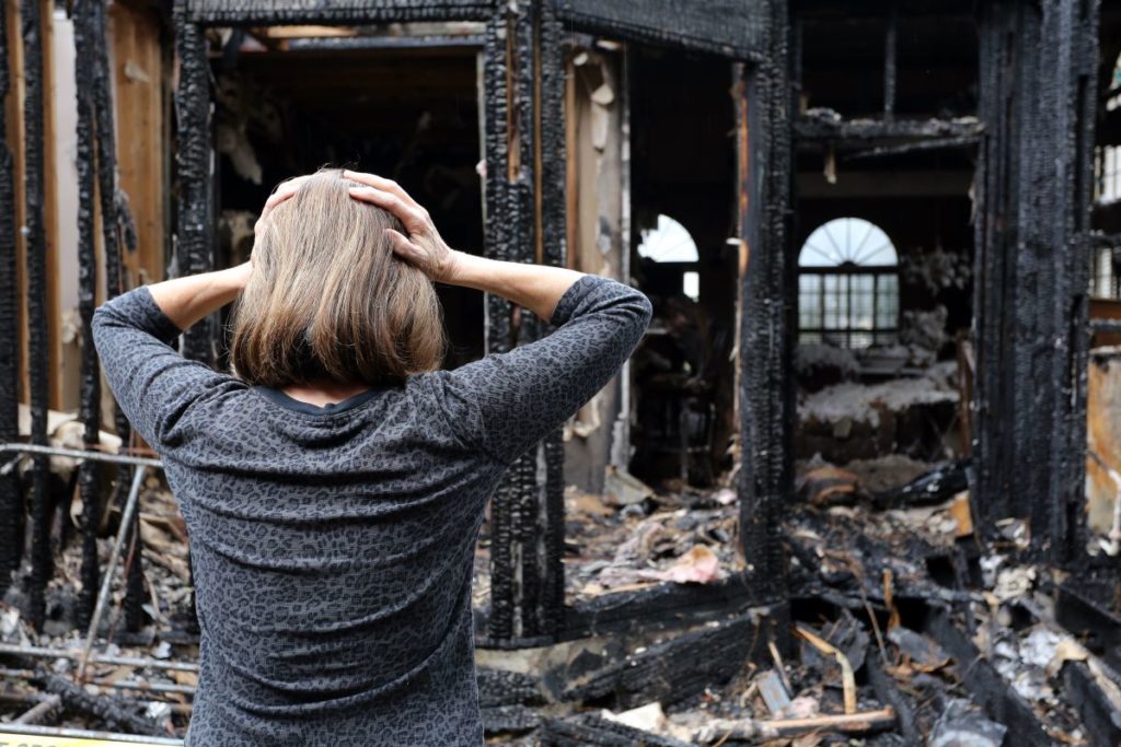 woman devastated after house is burnt down