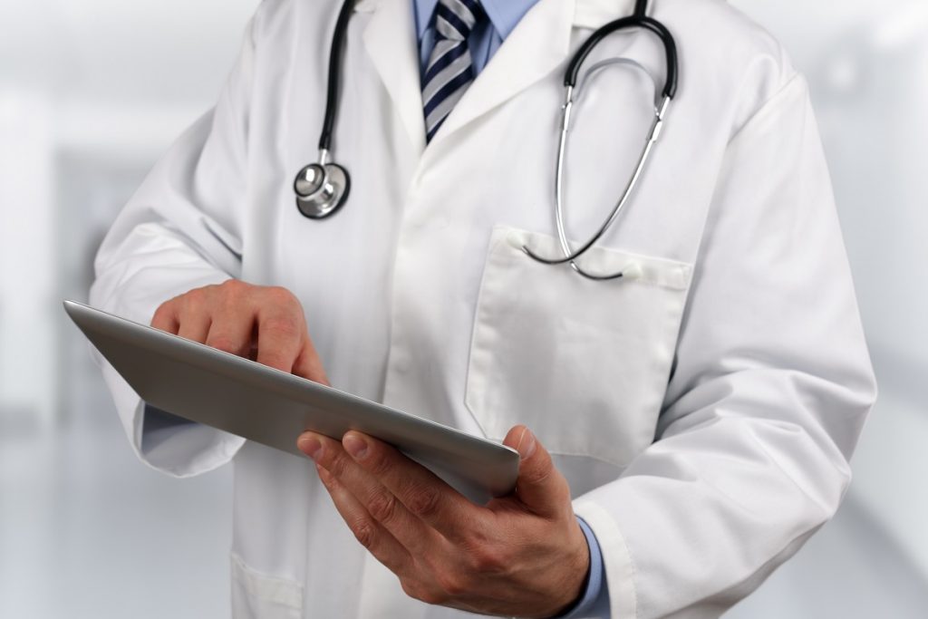doctor using tablet