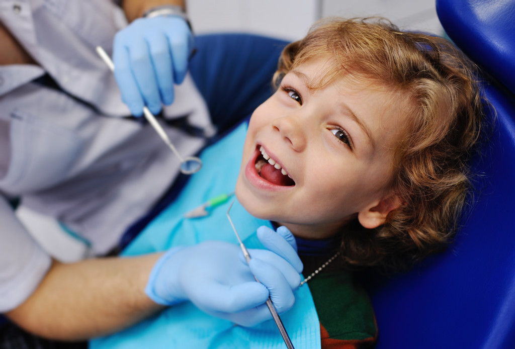 child with a dentist