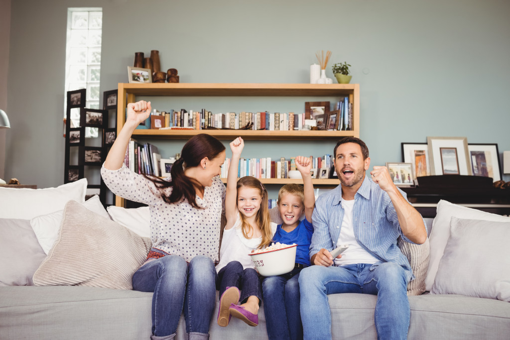family celebrating on their living room