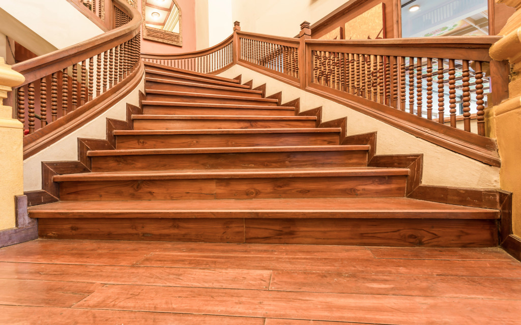 a picture of a wooden stairs in an antique house